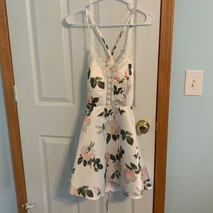 Short white with floral print dress in a size small